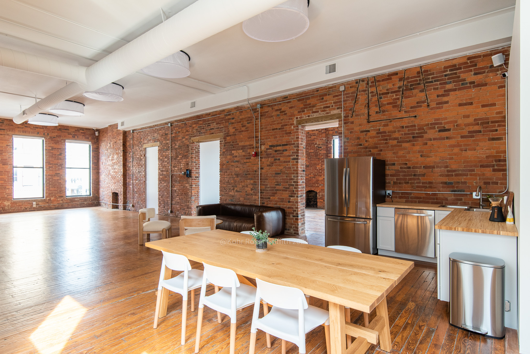 Brightly lit spacious modern office creative work space